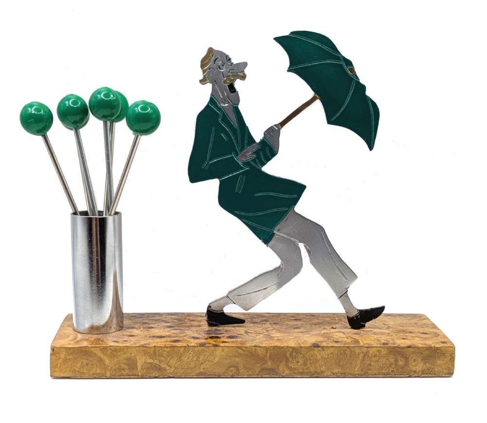 art deco comical man with umbrella cocktail sticks by sudre c1930