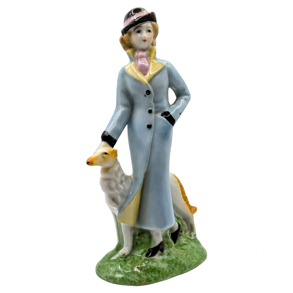 art deco ceramic lady with her beloved dog c1930